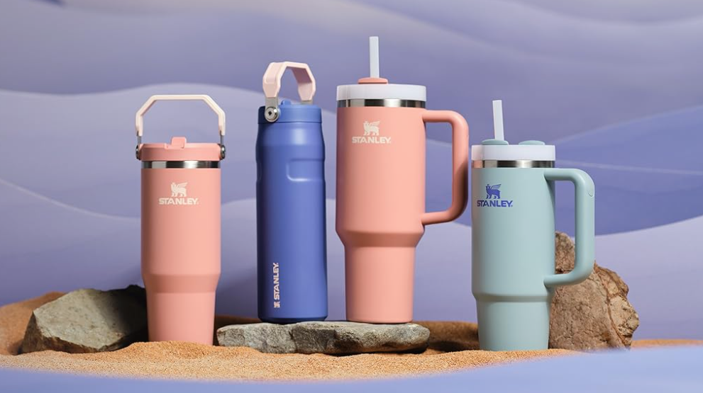 Stanley insulated drinkware collection in coral pink, navy blue, and mint green colors
